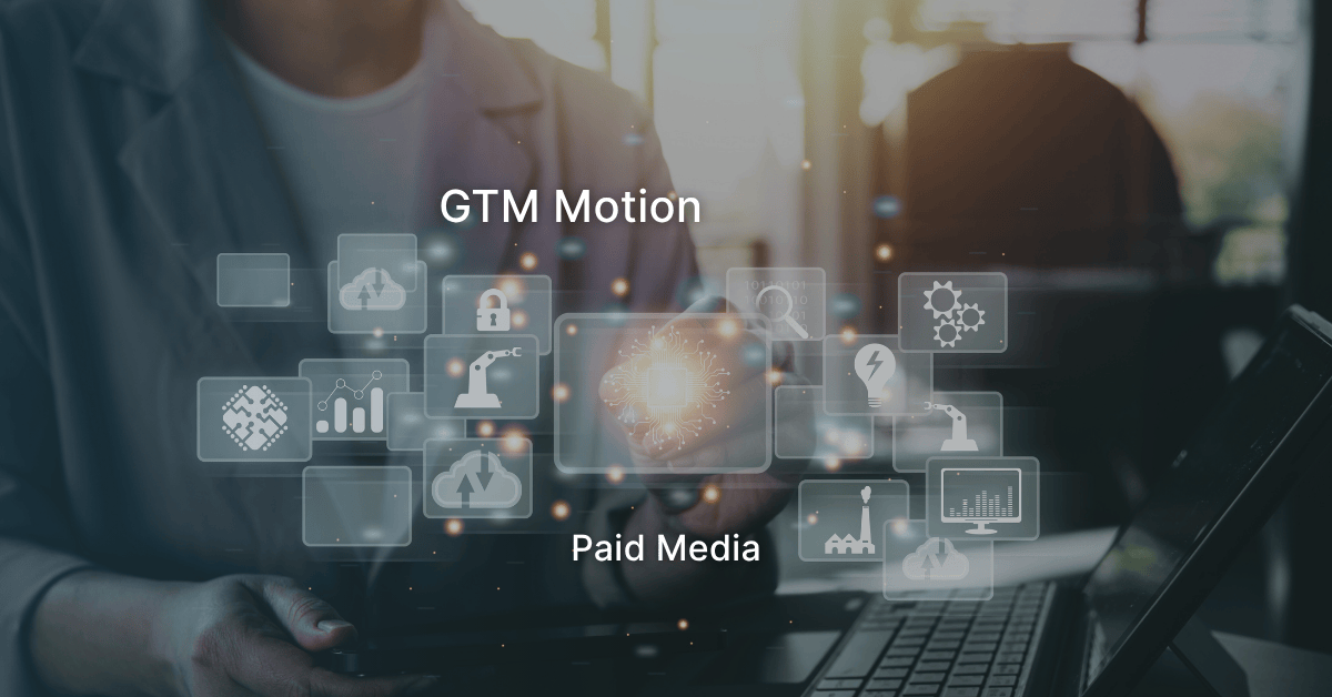A marketer analyzing multiple dashboards and campaign data to align paid media strategy with the company’s GTM motion.